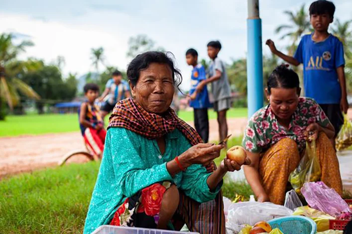 Bustling local Khmer market with fruits